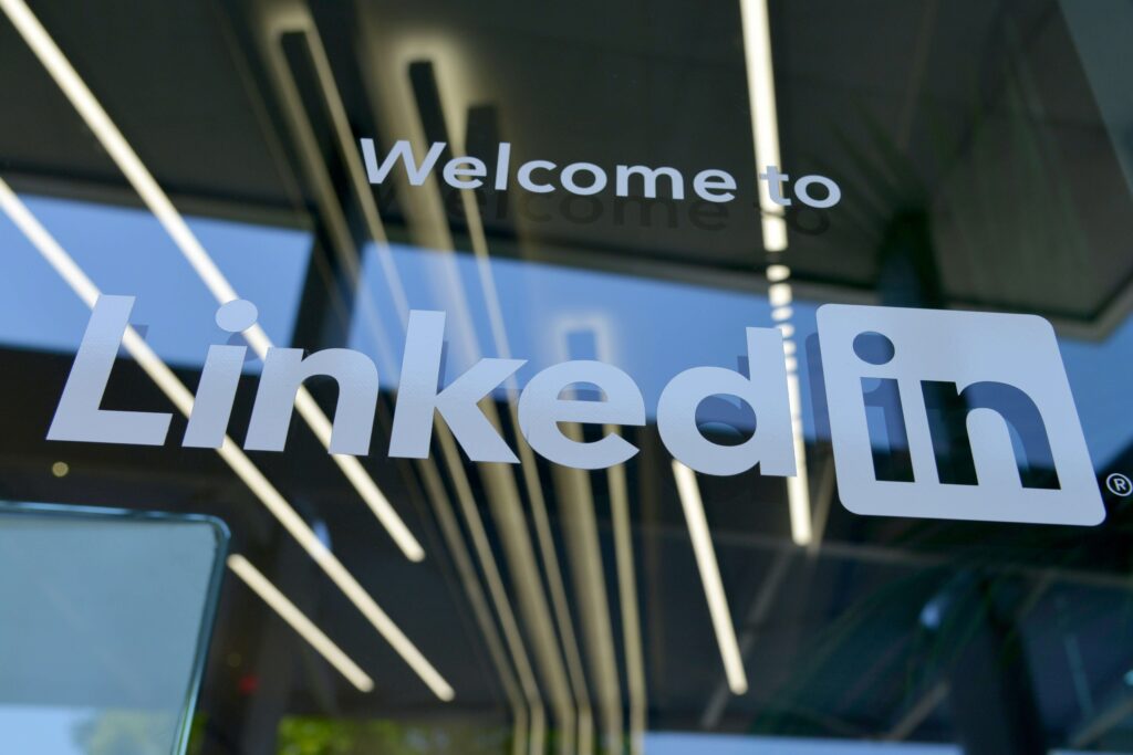 Supercharge Your LinkedIn Profile: The Essential Resume for Digital Marketers in 2024 7 Window with 'LinkedIn' written on it, representing personal branding on LinkedIn profile